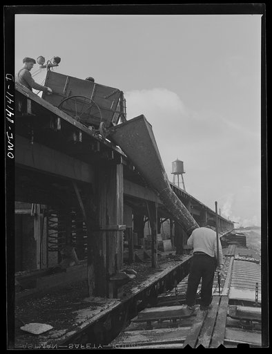 Untitled photo, possibly related to: Icing a car at the icing platform of the Indiana Harbor Belt Railroad