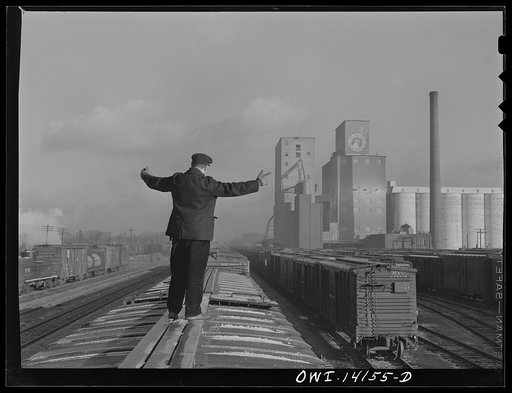 Untitled photo, possibly related to: Switchman giving the "go ahead" signal on an Indiana Harbor Belt Railroad train
