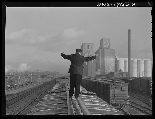 Untitled photo, possibly related to: Switchman giving the "go ahead" signal on an Indiana Harbor Belt Railroad train