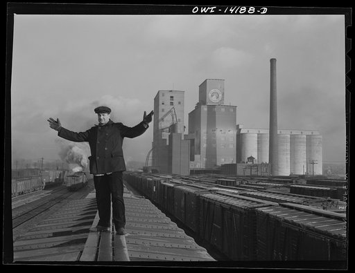 Untitled photo, possibly related to: Switchman giving the "go ahead" signal on an Indiana Harbor Belt Railroad train