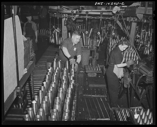 Detroit, Michigan. Steps in the manufacture of casings for 105 mm. shells in the Budd wheel plant. Stamping shell for identification
