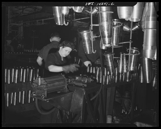 Detroit, Michigan. Steps in the manufacture of casings for 105 mm. shells in the Budd wheel plant. Stamping shell for identification