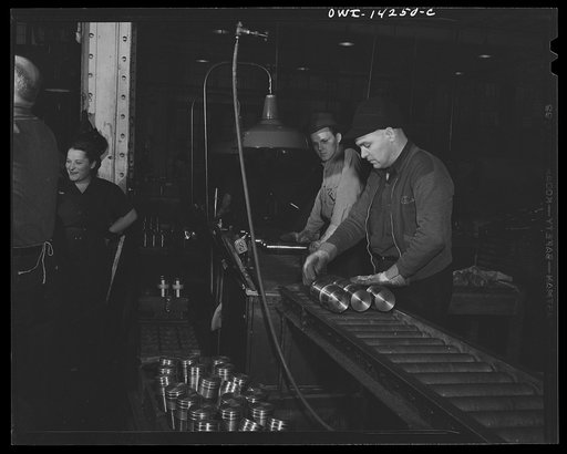 Detroit, Michigan. Steps in the manufacture of casings for 105 mm. shells in the Budd wheel plant. Process inspection of shells