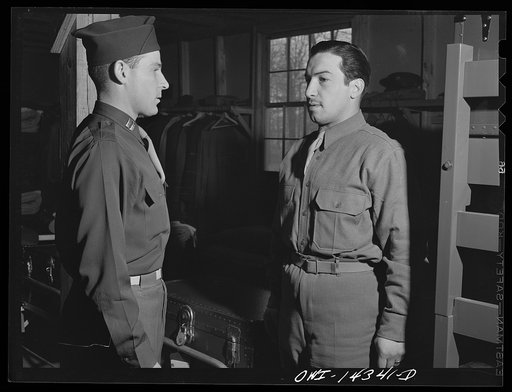 Fort Belvoir, Virginia. Captain Arthur talking with Private First Class Dalto at barracks inspection