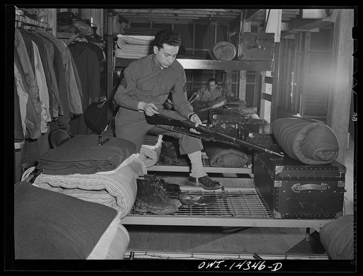 Fort Belvoir, Virginia. Sergeant Tauro cleaning a rifle