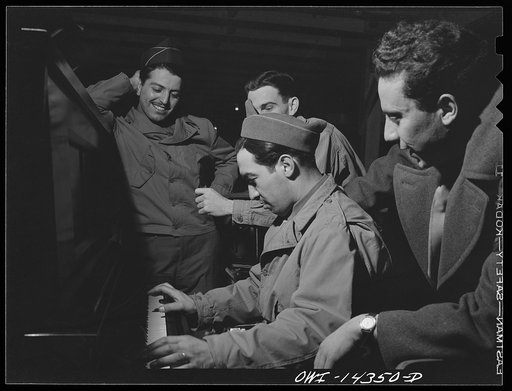 Fort Belvoir, Virginia. Private Dalto playing the piano