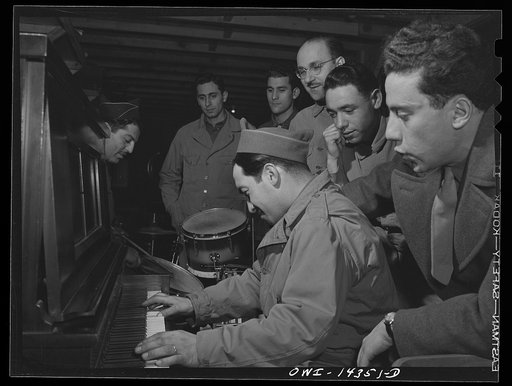 Fort Belvoir, Virginia. Private Dalto playing the piano