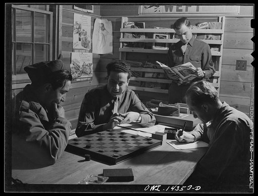 Fort Belvoir, Virginia. Private Dalto and Sergeant Tauro playing checkers in the recreation hall