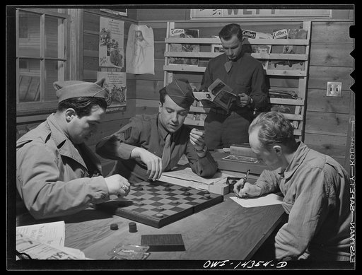 Untitled photo, possibly related to: Fort Belvoir, Virginia. Private Dalto and Sergeant Tauro playing checkers in the recreation hall