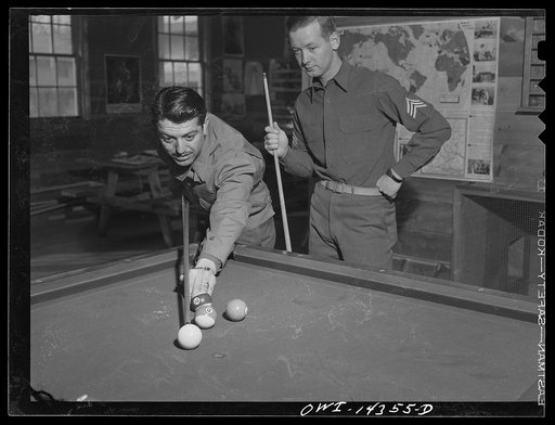 Fort Belvoir, Virginia. Private Chirico shooting pool with a sergeant
