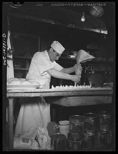 New York, New York. Cook making ravioli in Marcobi's restaurant at 118 Mulberry Street