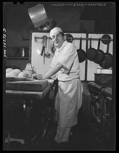 New York, New York. Cook making ravioli in Marcobi's restaurant at 118 Mulberry Street