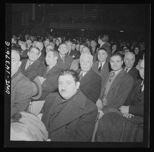 Untitled photo, possibly related to: New York, New York. Mourners at the funeral of Carlo Tresca, the Italian anarchist publisher of Il Martello, who was murdered on Fifth Avenue. The funeral was held in Manhattan Center and was attended by over 5000 anti-facists