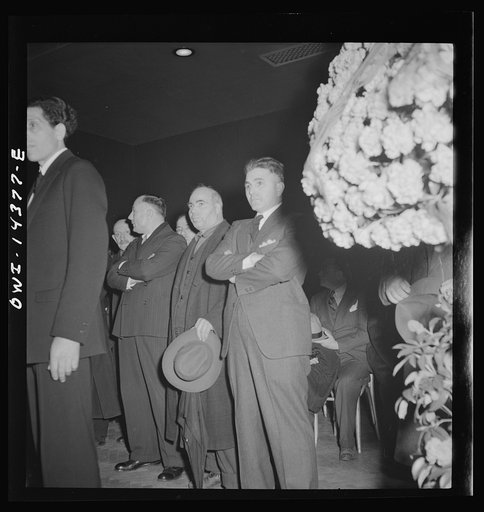 New York, New York. Mourners at the funeral of Carlo Tresca the Italian anarchist publisher of Il Martello, who was murdered on Fifth Avenue. The funeral was held in Manhattan Center and was attended by over 5000 anti-facists