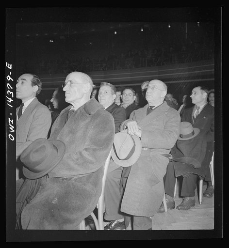 New York, New York. Mourners at the funeral of Carlo Tresca, the Italian anarchist publisher of Il Martello, who was murdered on Fifth Avenue. The funeral was held in Manhattan Center and was attended by over 5000 anti-facists