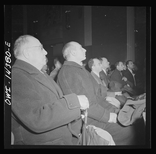 New York, New York. Mourners at the funeral of Carlo Tresca, the Italian anarchist publisher of Il Martello, who was murdered on Fifth Avenue. The funeral was held in Manhattan Center and was attended by over 5000 anti-facists