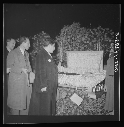 New York, New York. Mourners at the funeral of Carlo Tresca, the Italian anarchist publisher of Il Martello, who was murdered on Fifth Avenue. The funeral was held in Manhattan Center and was attended by over 5000 anti-facists