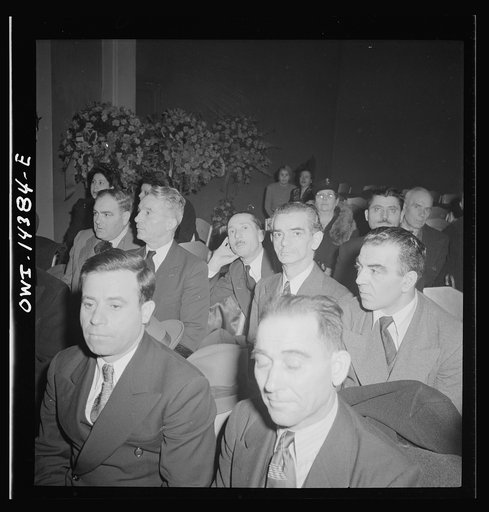 Untitled photo, possibly related to: New York, New York. Mourners at the funeral of Carlo Tresca the Italian anarchist publisher of Il Martello, who was murdered on Fifth Avenue. The funeral was held in Manhattan Center and was attended by over 5000 anti-facists