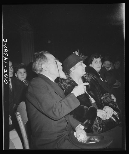 New York, New York. Mourners at the funeral of Carlo Tresca, the Italian anarchist publisher of Il Martello, who was murdered on Fifth Avenue. The funeral was held in Manhattan Center and was attended by over 5000 anti-fascists