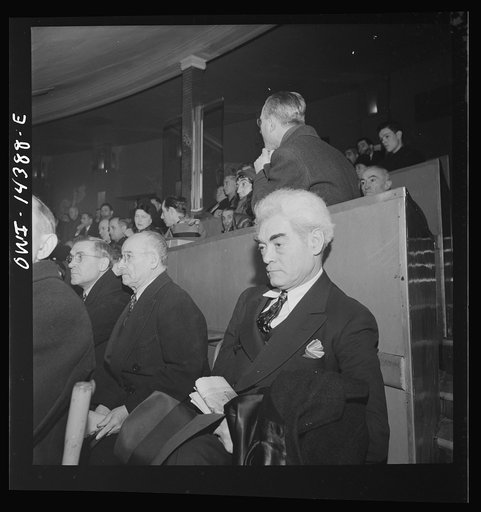 New York, New York. Mourners at the funeral of Carlo Tresca, the Italian anarchist publisher of Il Martello, who was murdered on Fifth Avenue. The funeral was held in Manhattan Center and was attended by over 5000 anti-fascists