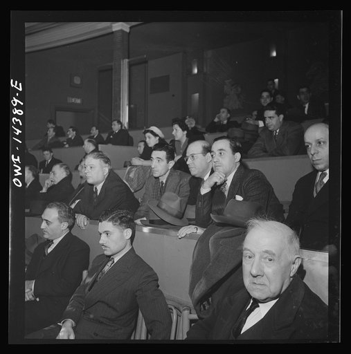 New York, New York. Mourners at the funeral of Carlo Tresca, the Italian anarchist publisher of Il Martello, who was murdered on Fifth Avenue. The funeral was held in Manhattan Center and was attended by over 5000 anti-fascists