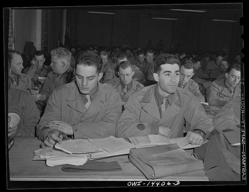 Fort Belvoir, Virginia. Compass reading class in the Officer Candidates' School. Candidates Joseph Passarello and Frank Frangipane are in the foreground. The parents of both of these men were born in Italy