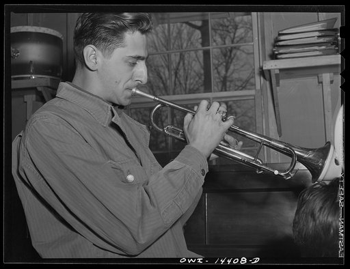 Fort Belvoir, Virginia. Private Thomas Cavallaro playing the trumpet
