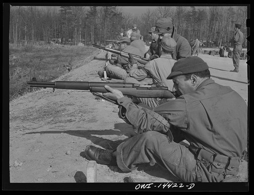 Fort Belvoir, Virginia. Private Paul Tellini on the rifle range. He is from Connecticut. Both of his parents were born Italy