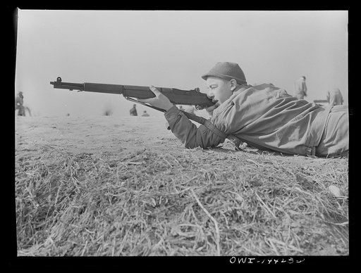 Fort Belvoir, Virginia. Private Lawrence Chiucarello firing on the range