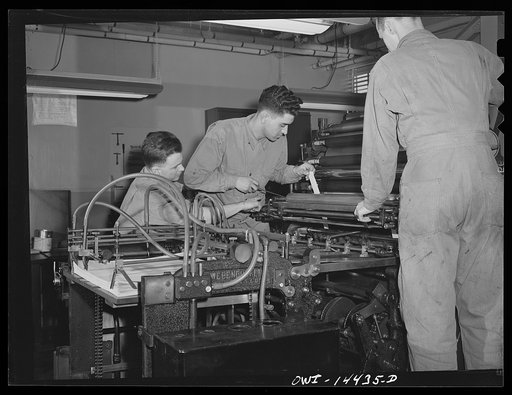 Fort Belvoir, Virginia. Anthony D. Bartholomol, Technician, Fifth Grade, working on a lithographic press used for map reproductions
