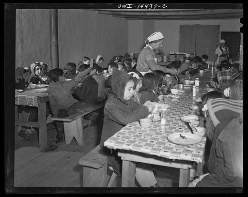 Penasco, New Mexico. Hot lunch provided by community support at a grade and high school administered by the Roman Catholic church