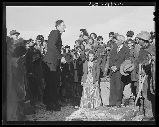 Untitled photo, possibly related to: Penasco, New Mexico. Justice of the peace making a speech "in the grand manner" at the dedication of the new building for the clinic operated by the Taos County cooperative health association