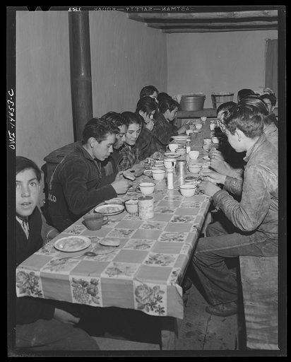 Penasco, New Mexico. Hot lunch provided by community support at a grade and high school administered by the Roman Catholic church