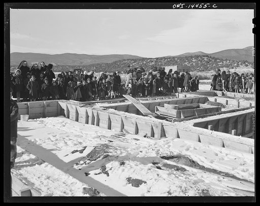 Untitled photo, possibly related to: Penasco, New Mexico. School children attending the dedication of the new building for the clinic operated by the Taos County cooperative health association. They are from a state school administered by the Roman Catholic church