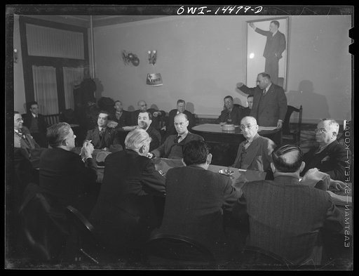New York, New York. Meeting of Local 48, International Ladies Garment Workers union, at which the sale of bonds was discussed. A portrait of Dubinski is on the wall. The International Ladies Garment Workers union has 10,000 members and has bought 500,000 dollars worth of bonds so far
