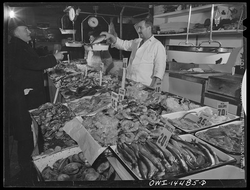 Untitled photo, possibly related to: New York, New York. Fish merchant in the First Avenue market at Tenth Street