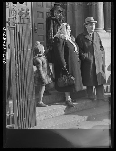 Untitled photo, possibly related to: New York, New York. Italian family on the steps of a Catholic church in the Bronx after mass on Sunday