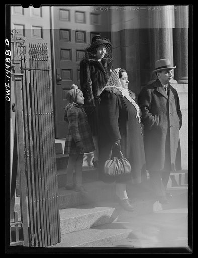 Untitled photo, possibly related to: New York, New York. Italian family on the steps of a Catholic church in the Bronx after mass on Sunday