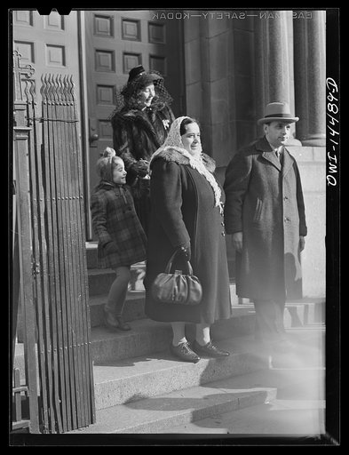 Untitled photo, possibly related to: New York, New York. Italian family on the steps of a Catholic church in the Bronx after mass on Sunday