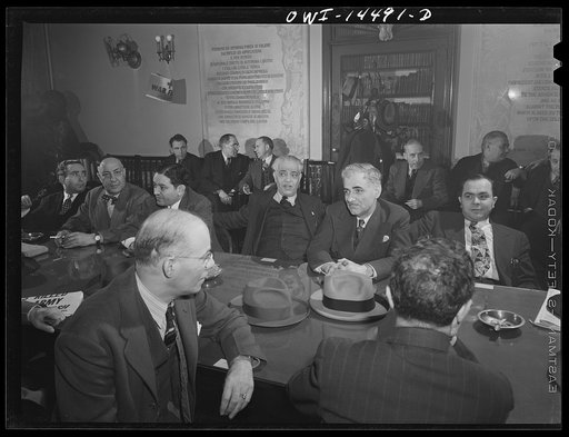 New York, New York. Meeting of Local 48, International Ladies Garment Workers union, at which the sale of bonds was discussed. The poem in Italian on the rear wall concerns labor. The International Ladies Garment Workers' union has 10,000 members and has bought 500,000 dollars worth of bonds so far