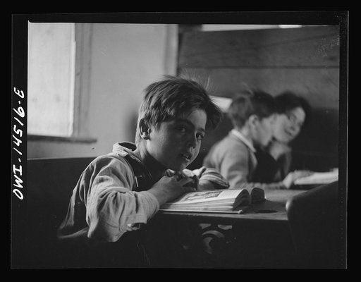 Ojo Sarco, New Mexico. One-room school in an isolated mountainous Spanish-American community, which has eight grades and two teachers. Most of the teaching is in Spanish, the language spoken in the children's homes, and as a result they rarely speak English fluently
