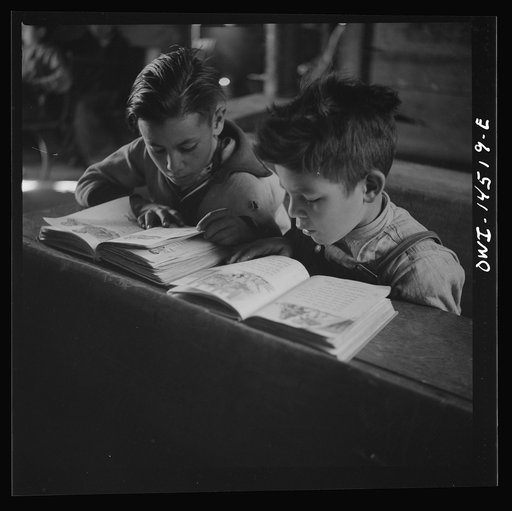 Ojo Sarco, New Mexico. One-room school in an isolated mountainous Spanish-American community, which has eight grades and two teachers. Most of the teaching is in Spanish, the language spoken in the children's homes, and as a result they rarely speak English fluently