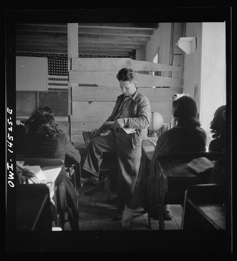 Ojo Sarco, New Mexico. One-room school in an isolated mountainous Spanish-American community, which has eight grades and two teachers. Most of the teaching is in Spanish, the language spoken in the children's homes, and as a result they rarely speak English fluently