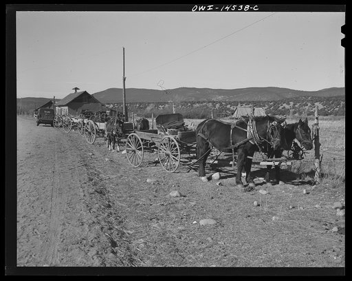 Penasco, New Mexico. Wagons hitched in front of the clinic operated by the Taos County cooperative health association