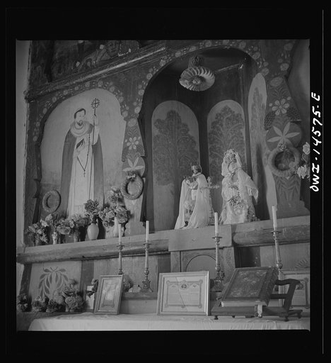 Trampas, New Mexico. Santos on the main altar in a church which was built in 1700 and is the best-preserved colonial mission in the Southwest