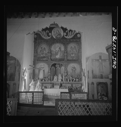 Trampas, New Mexico. Main altar in a church which was built in 1700 and is the best-preserved colonial mission in the Southwest