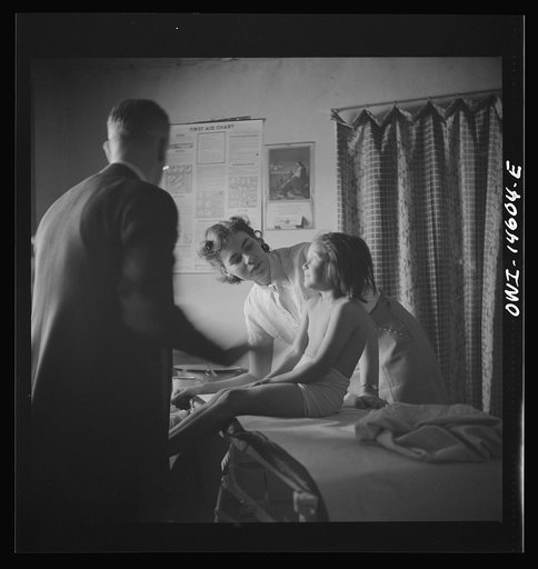 Untitled photo, possibly related to: Penasco, New Mexico. Taos County public health nurse assisting in the clinic