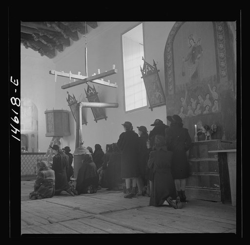 Trampas, New Mexico. Service at the mission church. The painting on the retablo represents Nuestra Senora del Carmel