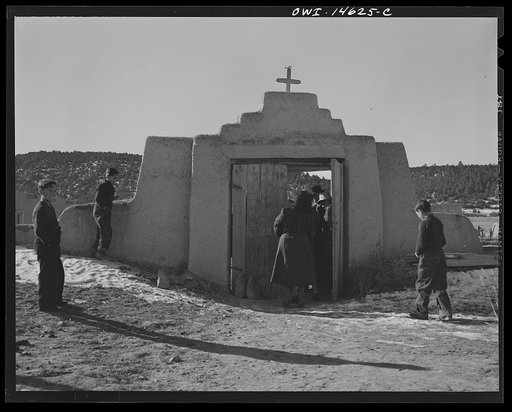 Trampas, New Mexico. Congregation leaving after mass from a church which was built in 1700 and is the best-preserved colonial mission in the Southwest