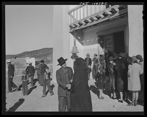 Trampas, New Mexico. Congregation leaving after mass from a church which was built in 1700 and is the best-preserved colonial mission in the Southwest
